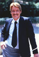 Perry King in a formal suit photo print
