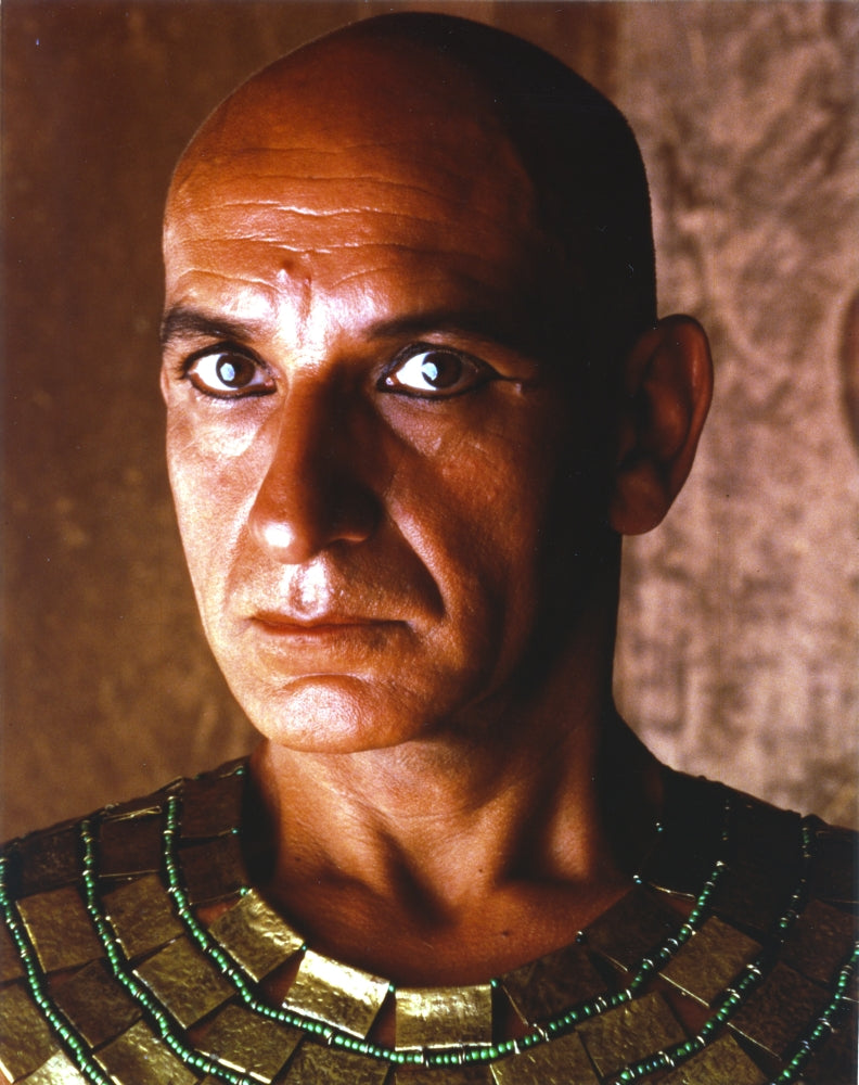 Close up portrait of Ben Kingsley in a gold Egyptian outfit photo print