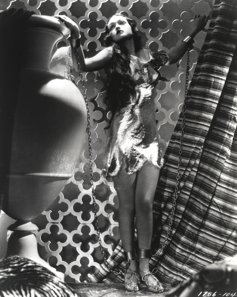 Dorothy Lamour photo print, elegantly posed with an urn, classic Hollywood decor