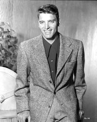 Burt Lancaster wearing a tuxedo in a leaning pose photograph print.