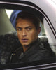 Jude Law in Car Photo Print, capturing a moment of cinematic allure.