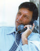 Ron Leibman Talking with Telephone Photo Print showcasing candid charm.