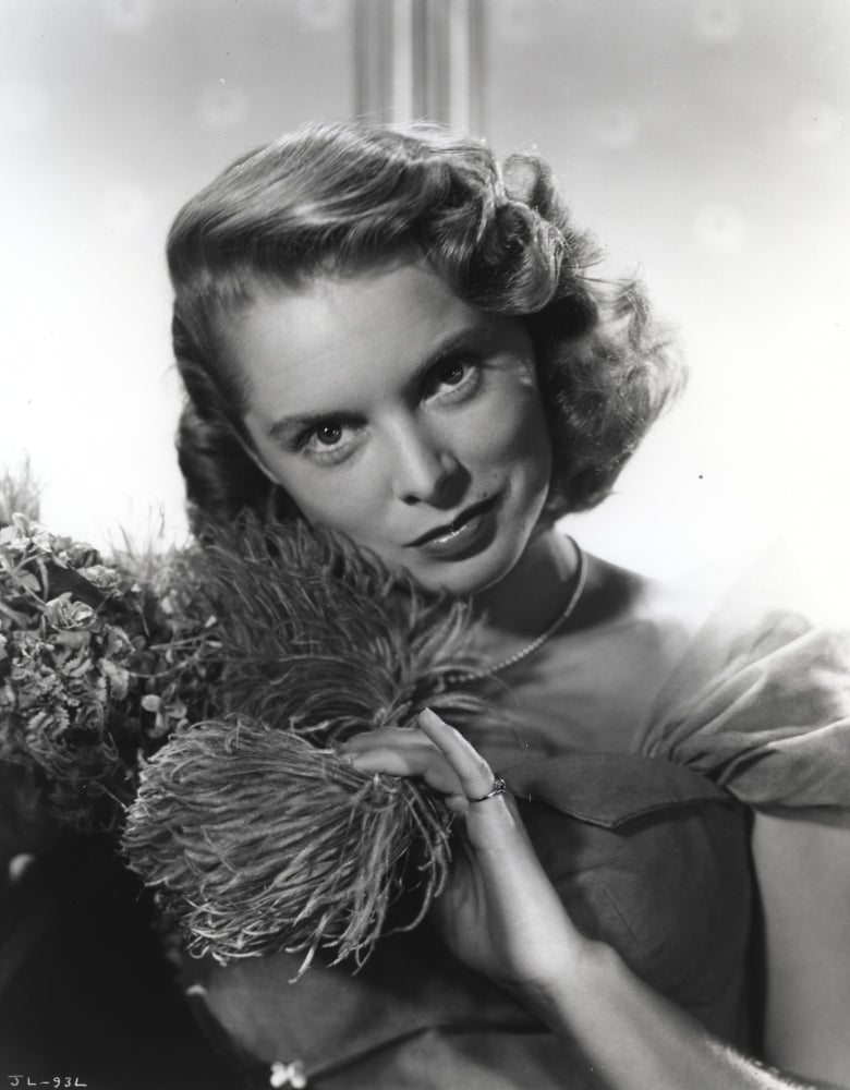Janet Leigh close up portrait in black sheer dress with silver necklace
