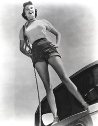 Janet Leigh standing outdoors with a rope - Photo Print