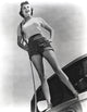 Janet Leigh standing outdoors with a rope - Photo Print