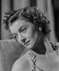 Portrait photo print of Myrna Loy, classic Hollywood actress.