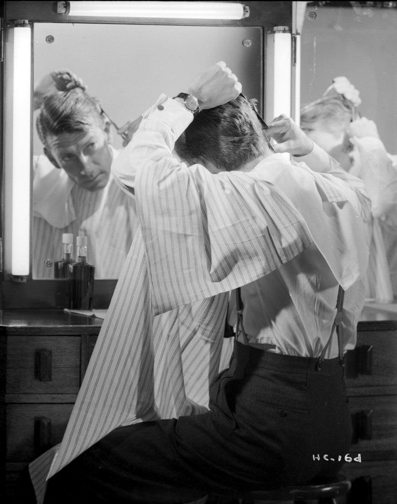 Hoagy Carmichael haircut photo print showcasing the musician in a personal moment.