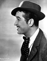 Maurice Chevalier wearing a polka dot bow tie photo print