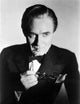 Cromwell Fletcher in Black Suit Photo Print showcasing elegance and sophistication.