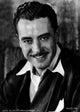 A Portrait of John Gilbert Photo Print showcasing classic cinema art.