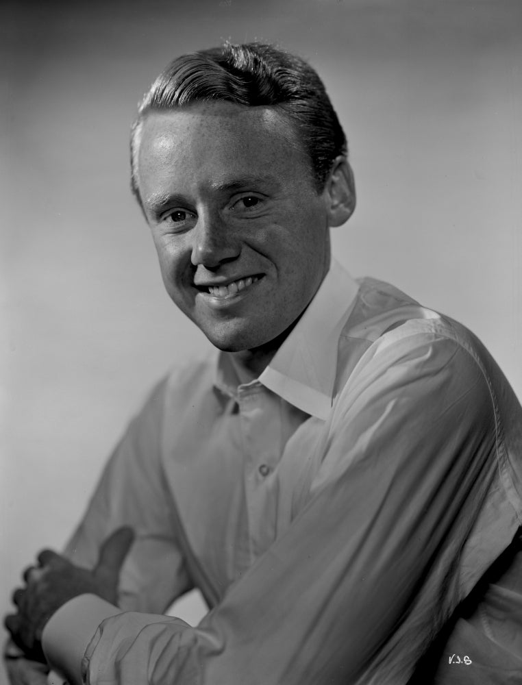 A Portrait of Van Johnson Photo Print showcasing classic Hollywood charm.