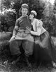 Harry Langdon Couple Scene Movie Photo Print showcasing classic cinema charm.