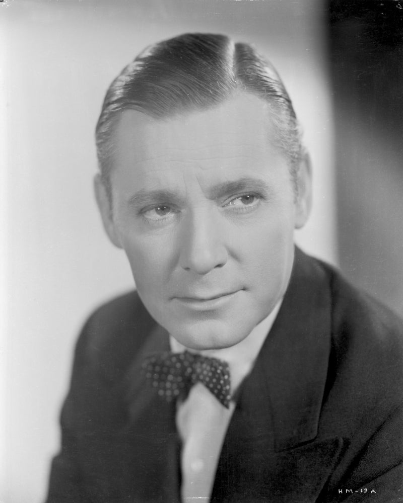 A Portrait of Herbert Marshall Photo Print showcasing classic film star.