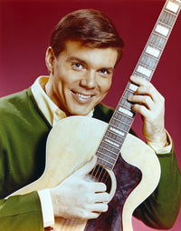 Close up portrait photo print of John Davidson with guitar.