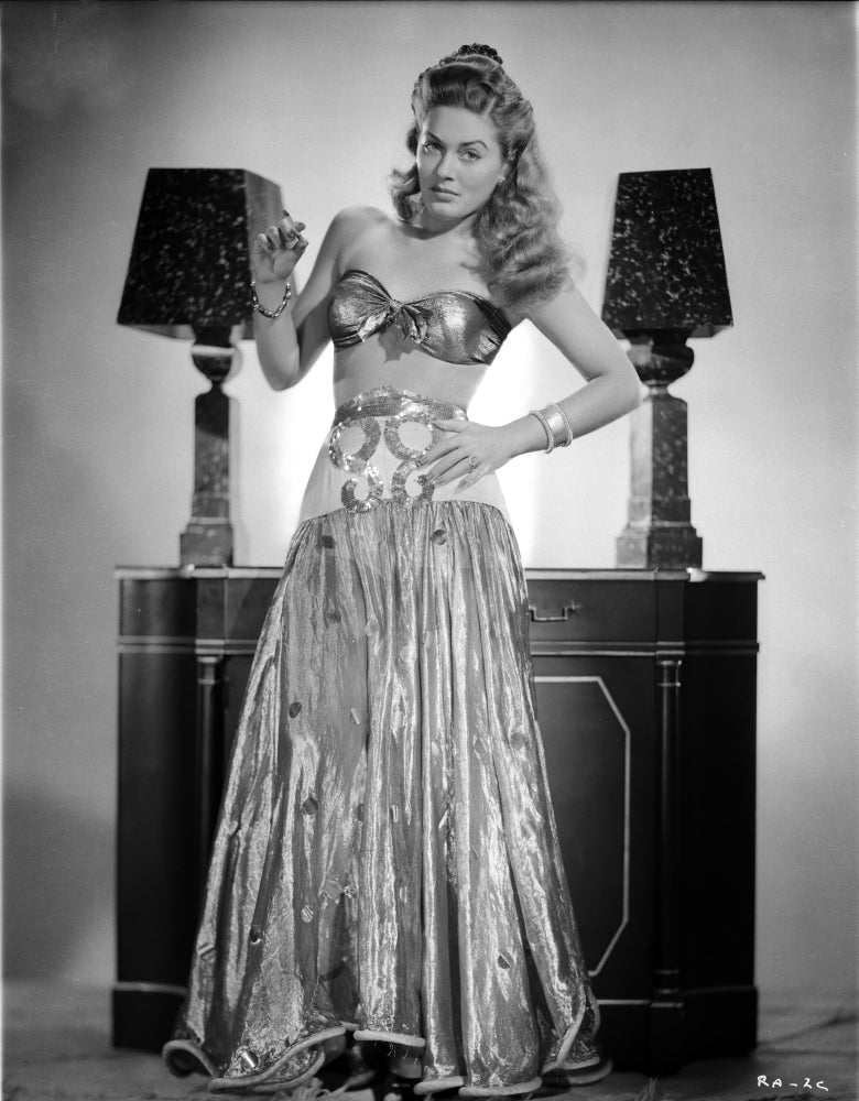 Ramsey Ames black and white photo print showing elegant lingerie pose with one hand on hips.