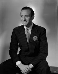 A Portrait Of David Niven Photo Print showcasing classic Hollywood elegance