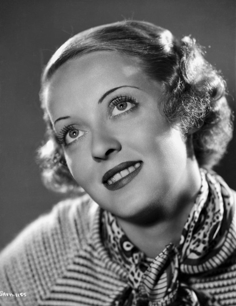 Bette Davis portrait photo print in knitted long sleeve shirt and neckerchief.