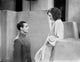 Greta Garbo Man Kneeling In Front of Her Photo Print
