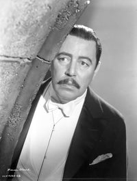 A Portrait of Warner Oland Photo Print showcasing classic cinema.
