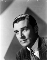 Walter Pidgeon posed in a suit photo print