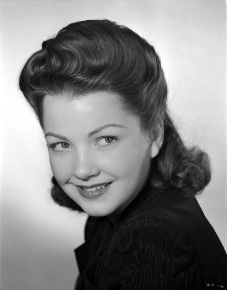 Anne Baxter smiling portrait photo print capturing classic Hollywood elegance.