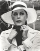 Ava Gardner portrait in coat and scarf with hat photo print.