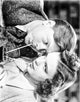 Judy Garland and Mickey Rooney Babes in Arms photo print from 1939, showcasing the iconic duo drinking from the same cup.
