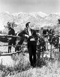 Cesar Romero film still from The Cisco Kid in black and white photo print.
