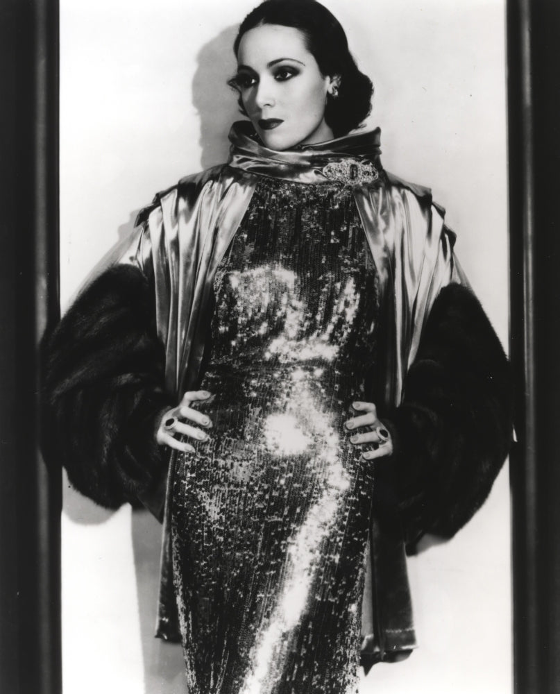 Dolores Del Rio posed in an elegant black and white photo print.