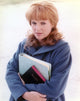 Sharon Gless holding a binder photo print, 8x10 size.