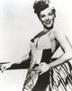 Paulette Goddard portrait photo print in elegant printed dress.