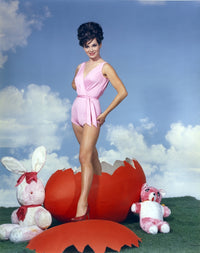 Gila Golan portrait photo print in pink dress with cloud background.