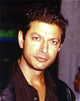 Jeff Goldblum posed in dark polo photo print, perfect for fans.