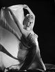 Leslie Brooks elegantly posed in gown with shawl against black background photo print