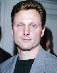 Tony Goldwyn posed in a suit photo print, elegant wall decor.