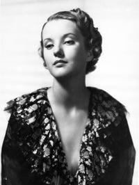 A Portrait of Phyllis Brooks Photo Print, showcasing elegance and charm.