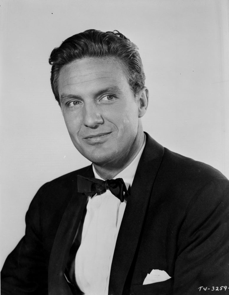 A Portrait Of Robert Stack Photo Print showcasing classic Hollywood charm.