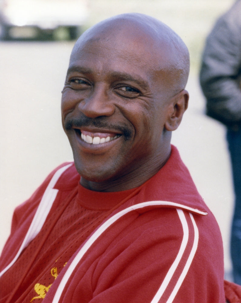 Louis Gossett Jr. posed in a red jacket photo print