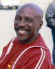 Louis Gossett Jr. posed in a red jacket photo print