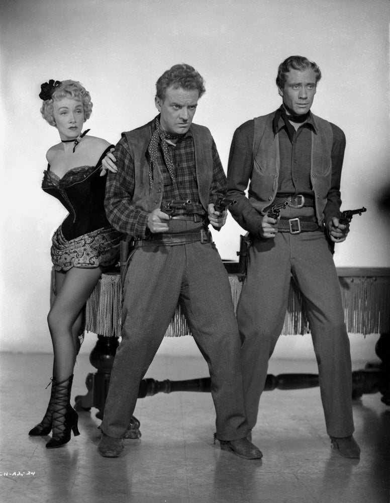 Marlene Dietrich photo print with two men holding pistols.