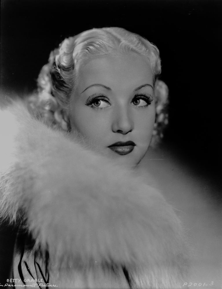 Betty Grable portrait in fur boa and long sleeve shirt photo print