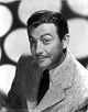 Robert Taylor posed in suit and tie photo print