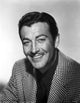 Robert Taylor smiling in a checkered suit photo print, classic Hollywood decor