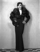 Classic photo print of Nancy Carroll with hands on waist