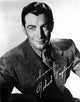 Robert Taylor Poster Photo Print showcasing classic cinema charm