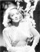 Marlene Dietrich posed elegantly in a dress with short hair photo print.
