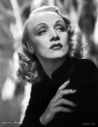 Marlene Dietrich posed in a black coat photo print.
