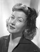 Portrait of Gloria Grahame in a black dress photo print.