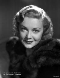 Madeleine Carroll portrait photo print in black dress with a smile.