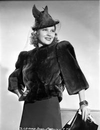 Mary Carlisle smiling in black furry jacket with veil photo print